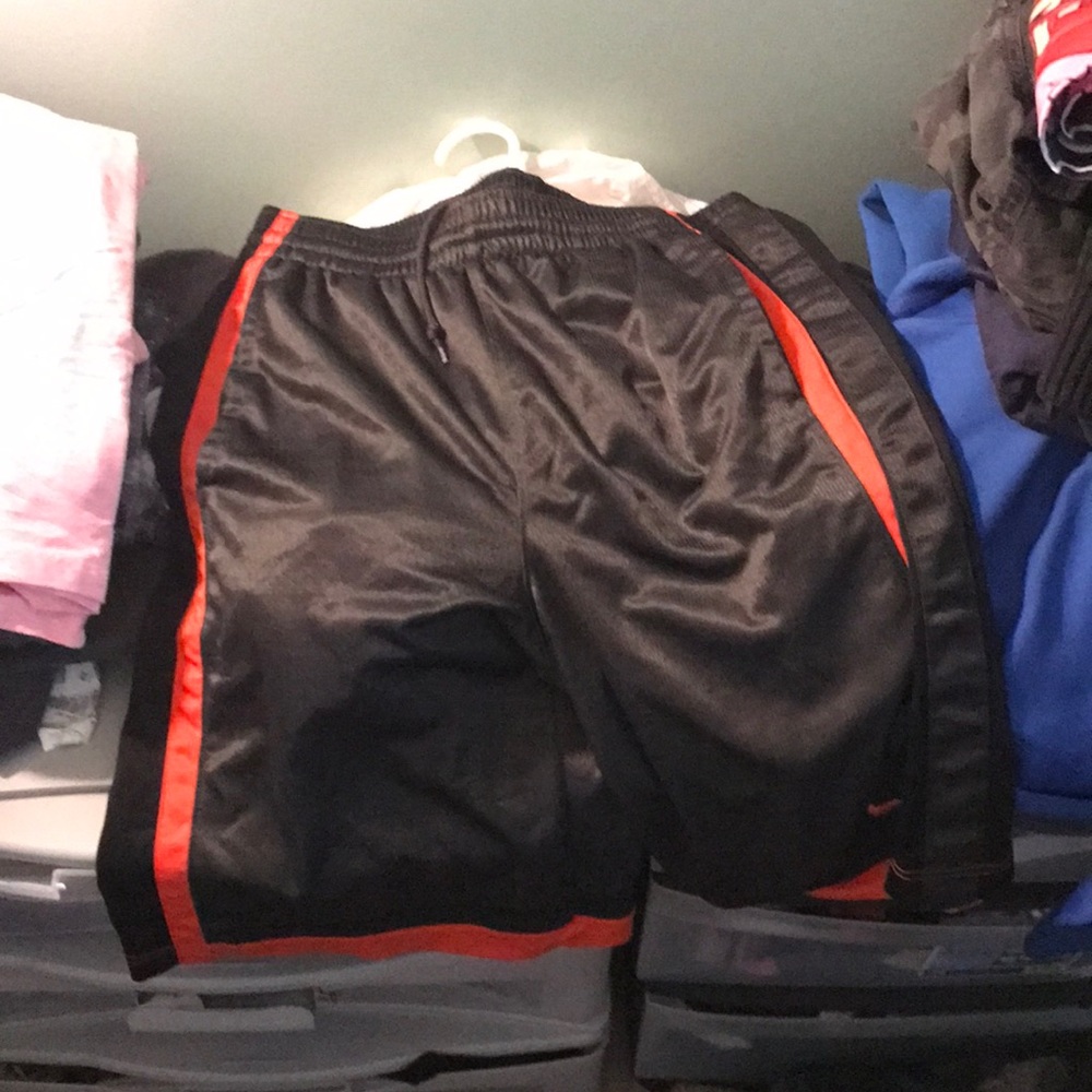 Nike black and orange basketball shorts